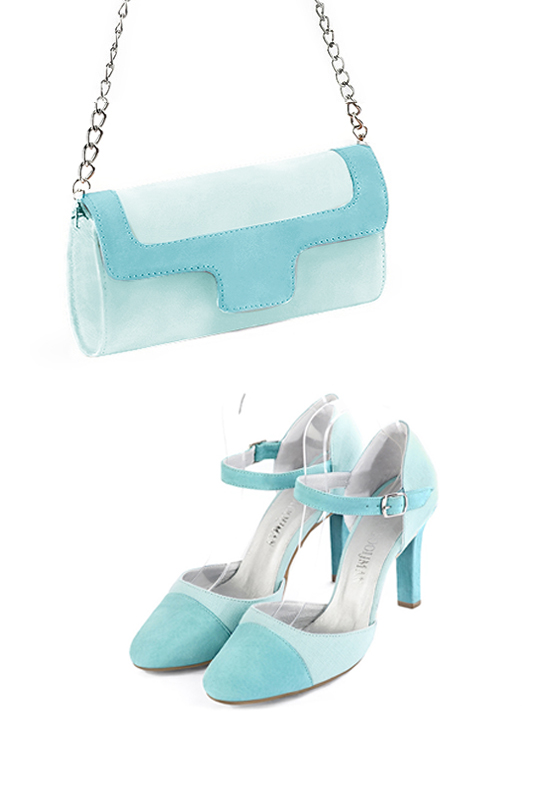 Women's aquamarine blue luxurious elegant clutch for ceremonies, weddings and evenings out. - Worn view